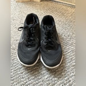 Nike running shoes, black and white